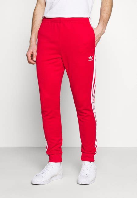 Siniset adidas Originals Housut miehille netistä .